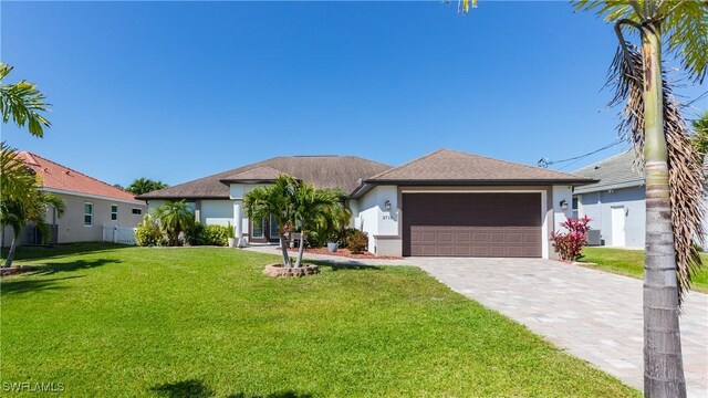 2714 SW 28th Ave, Cape Coral, FL 33914 - ranch-style house with decorative driveway, stucco siding, an attached garage, and a front lawn