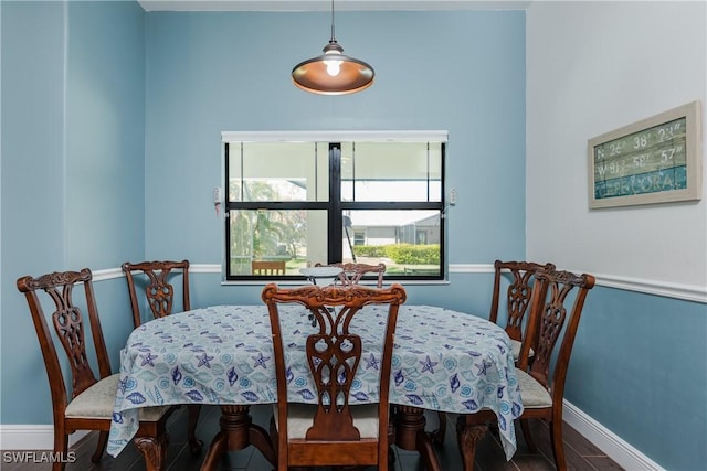 2714 SW 28th Ave, Cape Coral, FL 33914 - dining area featuring baseboards and wood finished floors