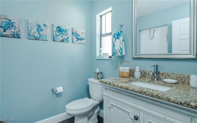 2714 SW 28th Ave, Cape Coral, FL 33914 - half bath featuring baseboards, toilet, and vanity