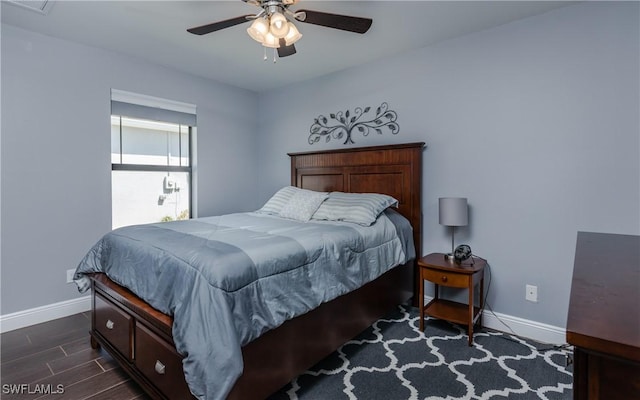 2714 SW 28th Ave, Cape Coral, FL 33914 - bedroom with wood finish floors, baseboards, and ceiling fan