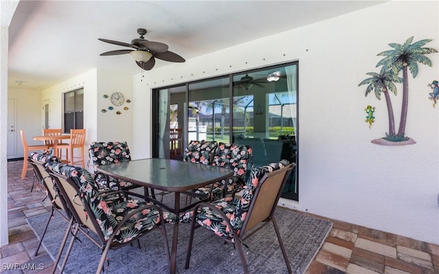 2714 SW 28th Ave, Cape Coral, FL 33914 - dining space featuring stone tile floors and ceiling fan
