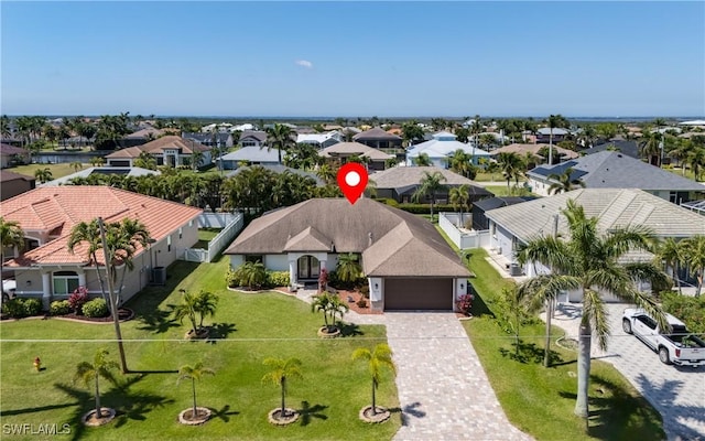 2714 SW 28th Ave, Cape Coral, FL 33914 - drone / aerial view with a residential view