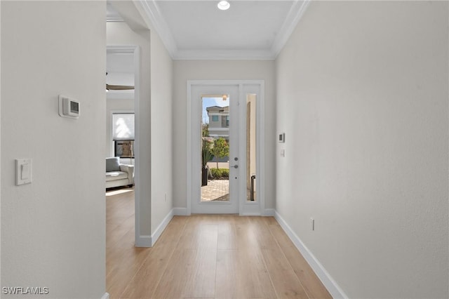 20333 Fair Oak Ln, Estero, FL 33928 - foyer featuring light wood-style flooring, ornamental molding, and baseboards