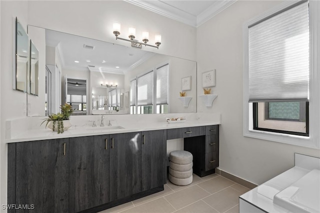 20333 Fair Oak Ln, Estero, FL 33928 - full bath with visible vents, baseboards, ornamental molding, vanity, and tile patterned flooring
