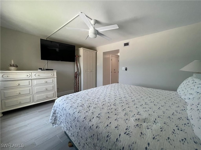 6672 Estero Blvd Unit A606, Fort Myers Beach, FL 33931 - bedroom featuring wood finished floors and a ceiling fan