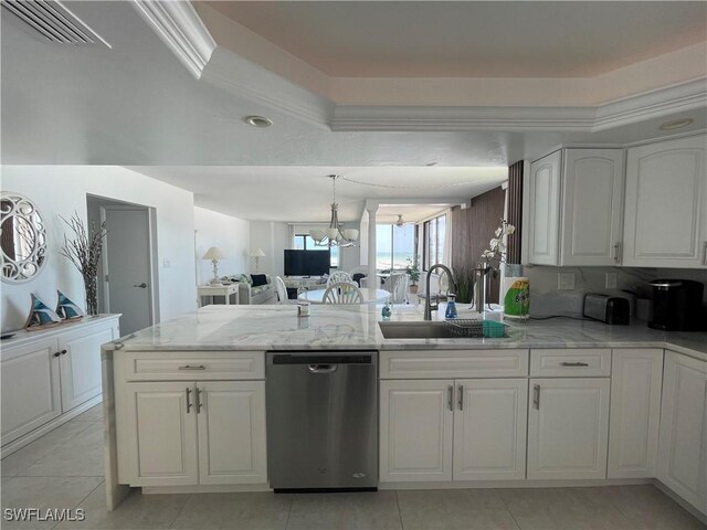 6672 Estero Blvd Unit A606, Fort Myers Beach, FL 33931 - kitchen featuring stainless steel dishwasher, a sink, a peninsula, white cabinetry, and light stone countertops