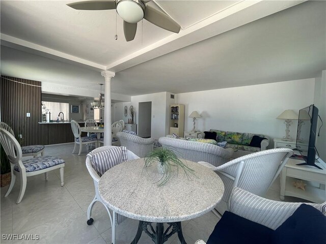 6672 Estero Blvd Unit A606, Fort Myers Beach, FL 33931 - dining area featuring decorative columns and ceiling fan