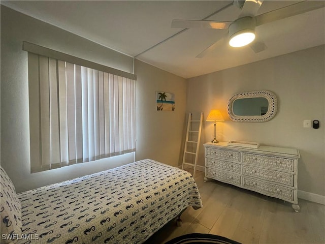 6672 Estero Blvd Unit A606, Fort Myers Beach, FL 33931 - bedroom with wood finished floors, baseboards, a ceiling fan, and vaulted ceiling