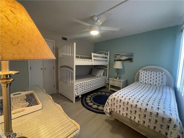 6672 Estero Blvd Unit A606, Fort Myers Beach, FL 33931 - bedroom featuring ceiling fan and wood finished floors
