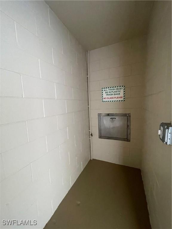 6672 Estero Blvd Unit A606, Fort Myers Beach, FL 33931 - hall featuring concrete block wall