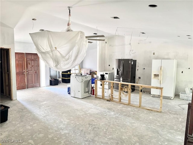 13470 Mcgregor Blvd, Fort Myers, FL 33919 - misc room featuring vaulted ceiling and washer / clothes dryer