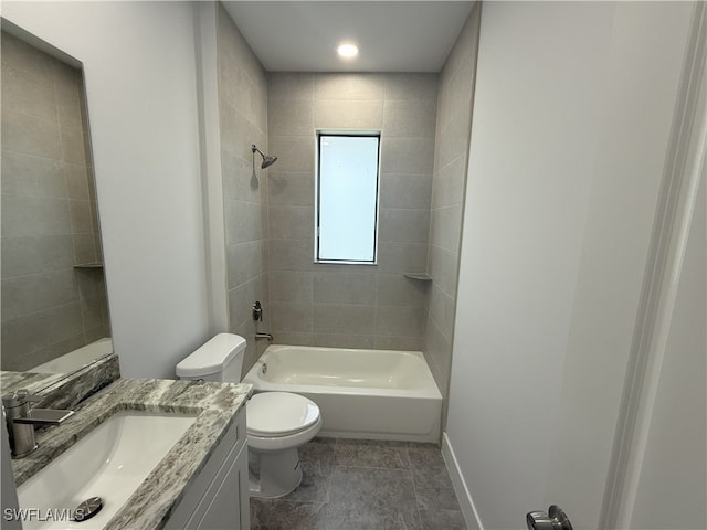 2803 17th St W, Lehigh Acres, FL 33971 - full bathroom featuring baseboards, bathtub / shower combination, toilet, and vanity