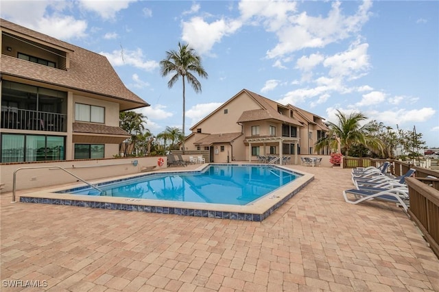 community pool featuring a patio