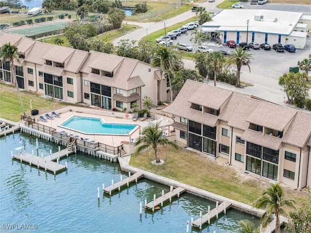 drone / aerial view with a water view