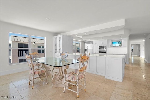 3127 W Gulf Dr Unit 106, Sanibel, FL 33957 - dining space with light tile patterned flooring, baseboards, and recessed lighting