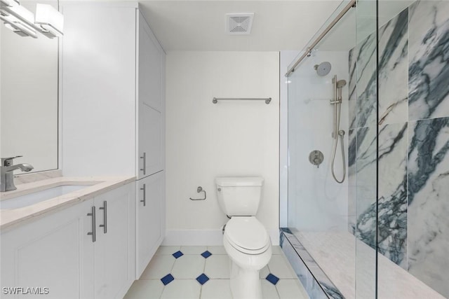 3127 W Gulf Dr Unit 106, Sanibel, FL 33957 - bathroom with vanity, toilet, baseboards, walk in shower, and visible vents