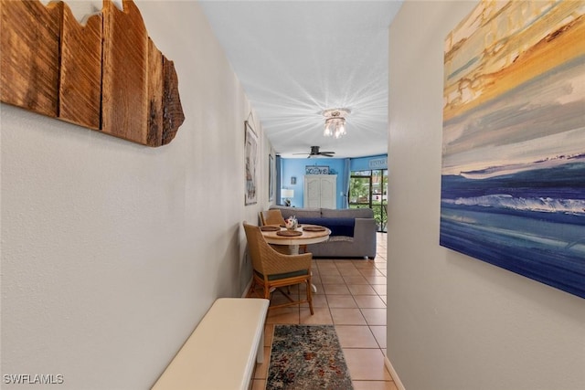 9623 Eaton Gardens Ln Unit 105, Fort Myers, FL 33919 - corridor featuring light tile patterned flooring