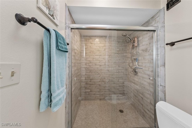 9623 Eaton Gardens Ln Unit 105, Fort Myers, FL 33919 - bathroom with visible vents, toilet, and a shower stall