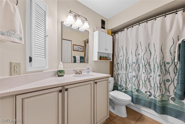 9623 Eaton Gardens Ln Unit 105, Fort Myers, FL 33919 - full bathroom featuring tile patterned floors, vanity, toilet, and shower / tub combo