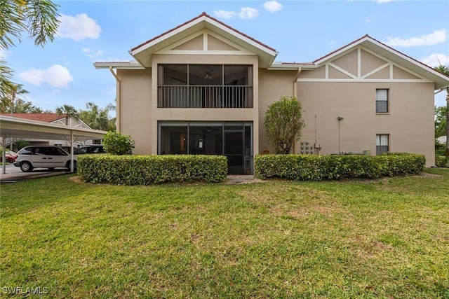 9623 Eaton Gardens Ln Unit 105, Fort Myers, FL 33919 - exterior space with stucco siding and a yard