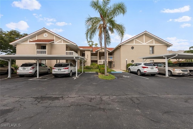 9623 Eaton Gardens Ln Unit 105, Fort Myers, FL 33919 - view of partially covered parking lot