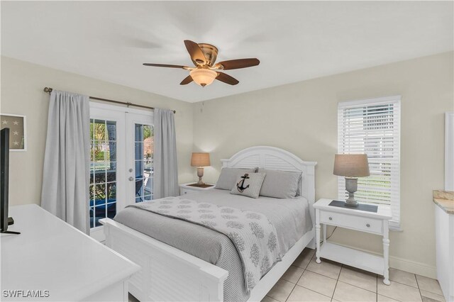 661 W Elkcam Cir Unit 911, Marco Island, FL 34145 - bedroom with access to outside, french doors, light tile patterned flooring, baseboards, and a ceiling fan