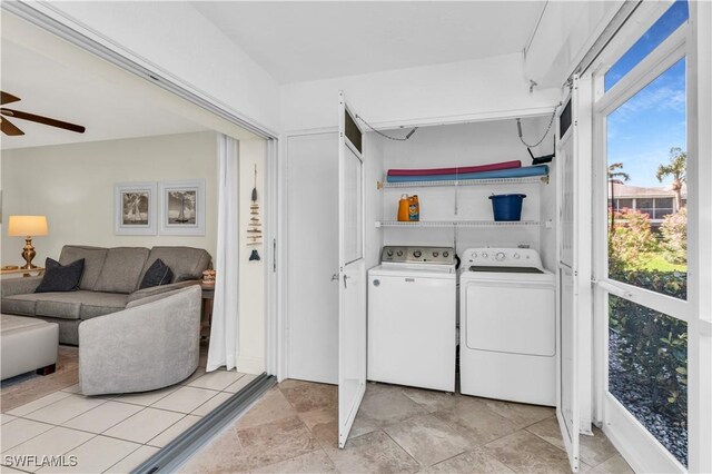 661 W Elkcam Cir Unit 911, Marco Island, FL 34145 - washroom with washer and dryer and a ceiling fan