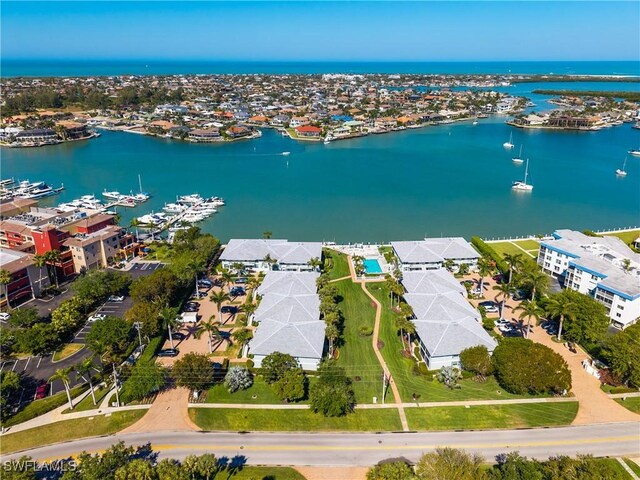 661 W Elkcam Cir Unit 911, Marco Island, FL 34145 - aerial perspective of suburban area with a large body of water