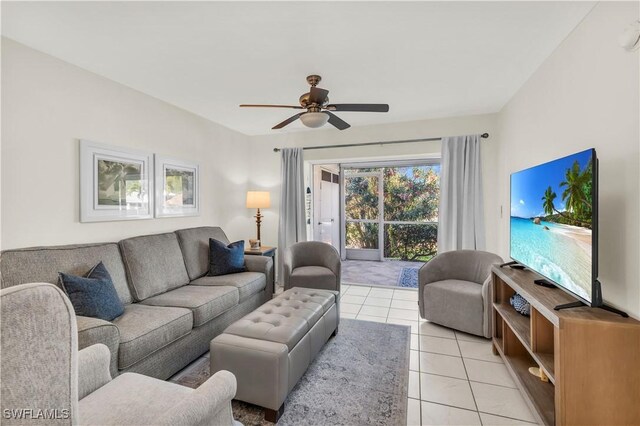 661 W Elkcam Cir Unit 911, Marco Island, FL 34145 - living area featuring light tile patterned floors and a ceiling fan