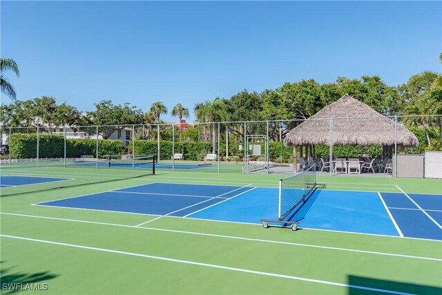 661 W Elkcam Cir Unit 911, Marco Island, FL 34145 - view of tennis court featuring community basketball court and a gazebo