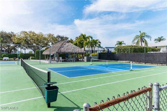 661 W Elkcam Cir Unit 911, Marco Island, FL 34145 - view of tennis court featuring community basketball court and a gazebo