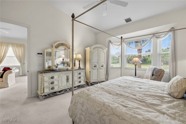 bedroom featuring ceiling fan, carpet floors, and visible vents