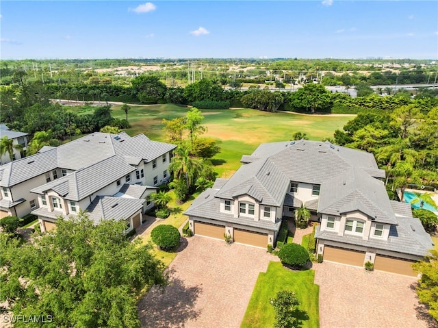 birds eye view of property featuring view of golf course