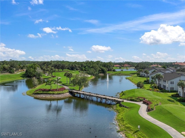 bird's eye view featuring golf course view and a water view