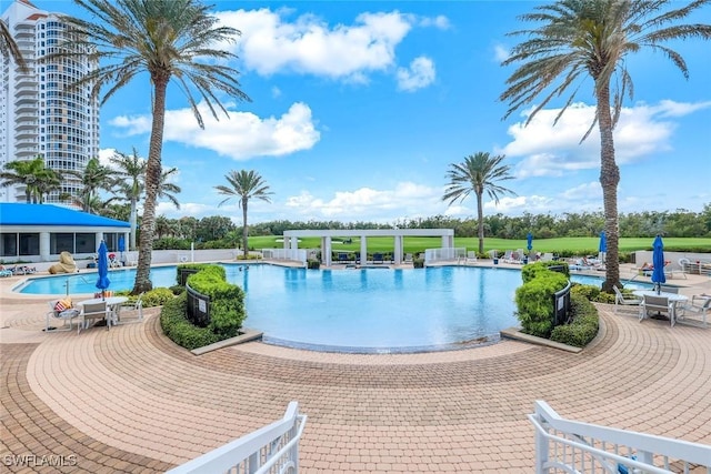 4971 Bonita Bay Blvd Unit 606, Bonita Springs, FL 34134 - community pool with a patio area