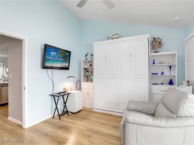 21687/689 Indian Bayou Dr, Fort Myers Beach, FL 33931 - sitting room featuring vaulted ceiling, light wood-style floors, and a ceiling fan