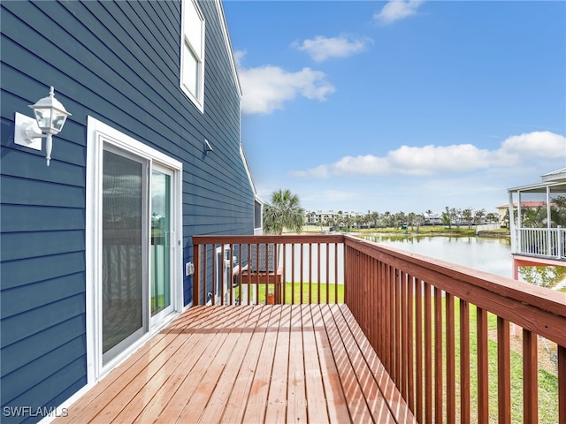21687/689 Indian Bayou Dr, Fort Myers Beach, FL 33931 - wooden deck featuring a water view