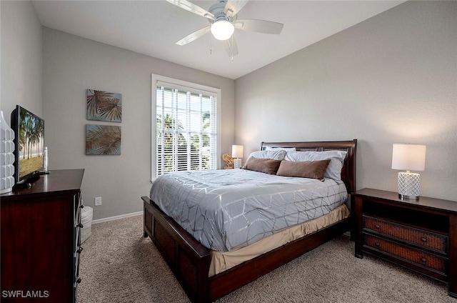 bedroom featuring baseboards, ceiling fan, and carpet flooring