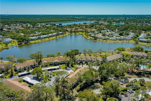 bird's eye view with a residential view and a water view