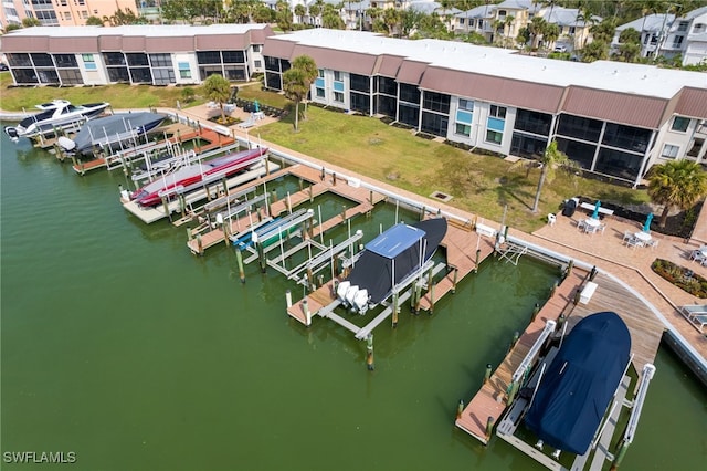 bird's eye view with a water view and a residential view