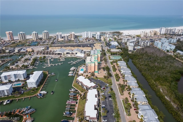 bird's eye view featuring a water view and a view of city