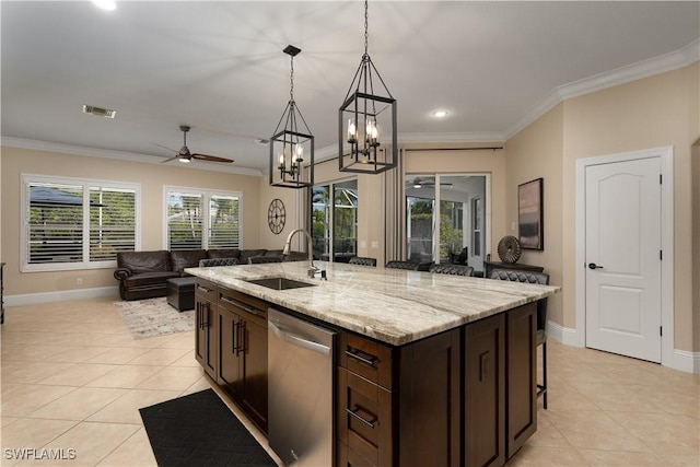 2613 Stonyhill Ct, Cape Coral, FL 33991 - kitchen with light tile patterned flooring, dishwasher, ceiling fan with notable chandelier, and a sink