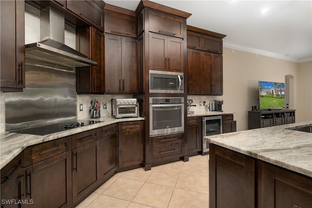 2613 Stonyhill Ct, Cape Coral, FL 33991 - kitchen with a toaster, wall chimney range hood, appliances with stainless steel finishes, tasteful backsplash, and wine cooler