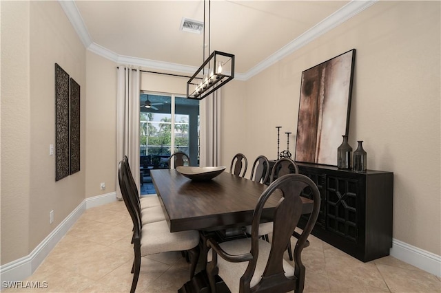 2613 Stonyhill Ct, Cape Coral, FL 33991 - dining space with a notable chandelier, crown molding, visible vents, and light tile patterned flooring