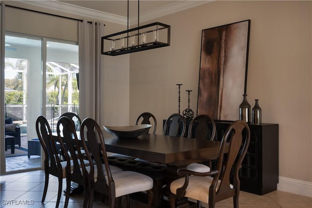 2613 Stonyhill Ct, Cape Coral, FL 33991 - dining room with baseboards, crown molding, and light tile patterned flooring