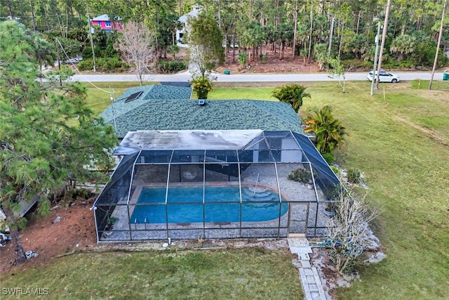 4500 1st Ave NW, Naples, FL 34119 - exterior space featuring a yard, a patio area, and glass enclosure