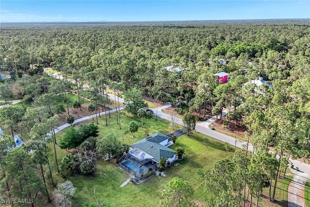 4500 1st Ave NW, Naples, FL 34119 - drone / aerial view with a forest view