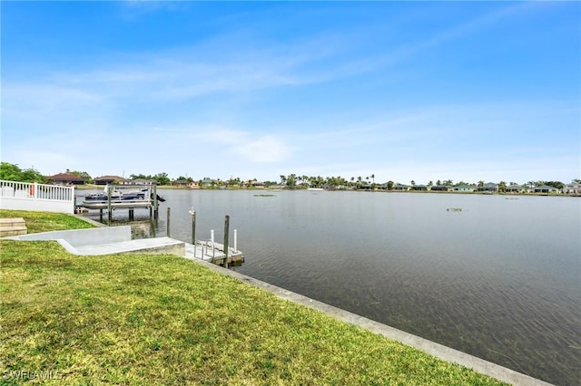 1703 SW 6th Ave, Cape Coral, FL 33991 - dock featuring a water view and a lawn