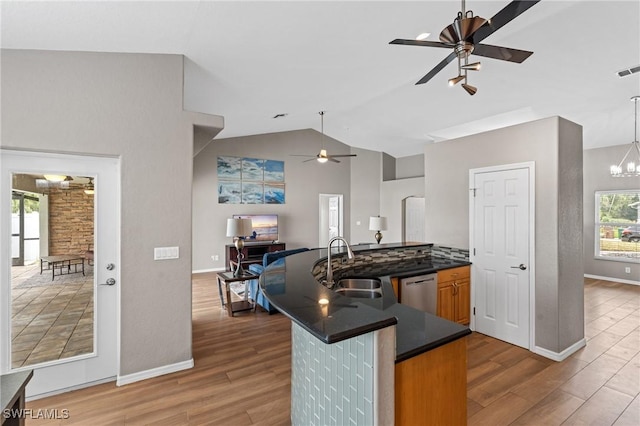 1703 SW 6th Ave, Cape Coral, FL 33991 - kitchen featuring ceiling fan, a sink, dark countertops, stainless steel dishwasher, and open floor plan