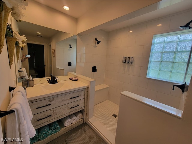 160 Coral Vine Dr, Naples, FL 34110 - bathroom featuring vanity, recessed lighting, and walk in shower